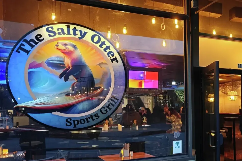The Salty Otter Sports Grill logo