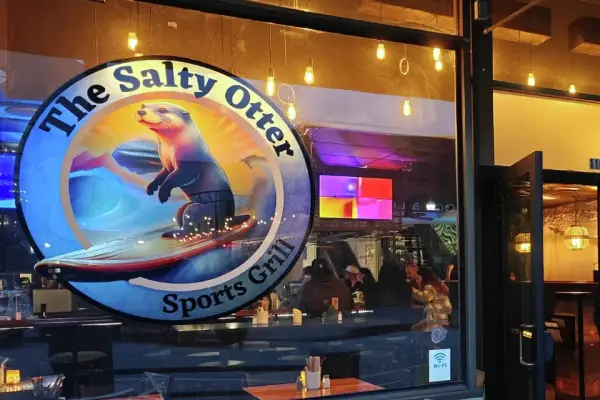 The Salty Otter Sports Grill logo